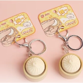 Speelse mini-dumpling sleutelhanger